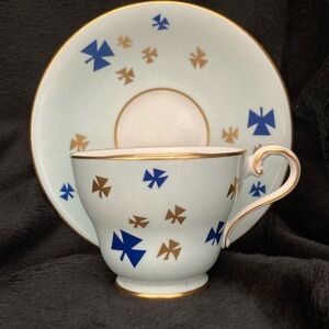 Aynsley bone china teacup and saucer with a Girl Guides pattern.